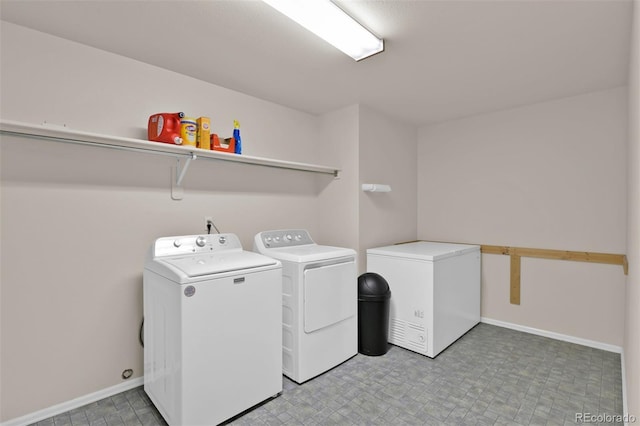 12454 Tex Tan Rd, Peyton, CO 80831 - laundry room featuring separate washer and dryer and baseboards