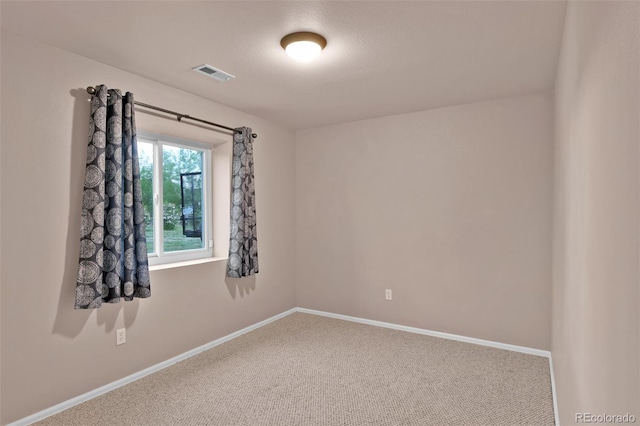 12454 Tex Tan Rd, Peyton, CO 80831 - spare room featuring carpet and baseboards