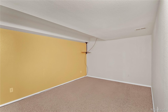 12454 Tex Tan Rd, Peyton, CO 80831 - spare room with carpet and baseboards
