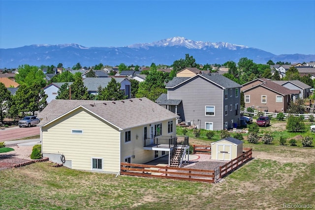 12454 Tex Tan Rd, Peyton, CO 80831 - view of mountain backdrop featuring nearby suburban area