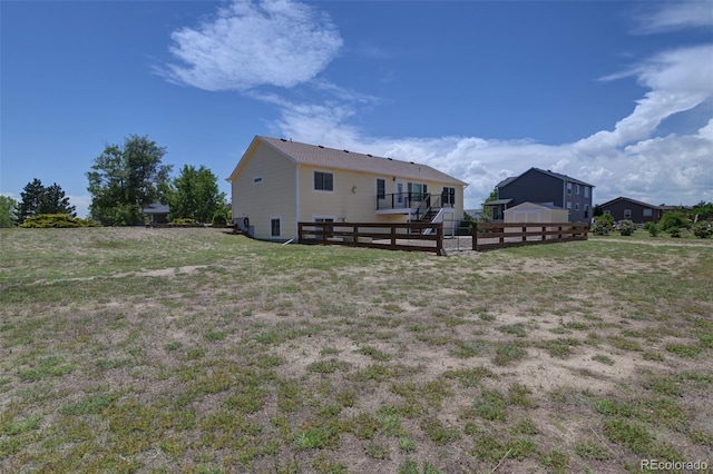 12454 Tex Tan Rd, Peyton, CO 80831 - rear view of house featuring a deck