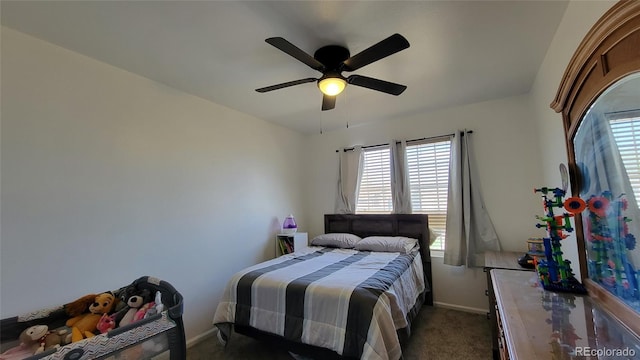 4214 Widener St, Pueblo, CO 81008 - carpeted bedroom with baseboards and ceiling fan