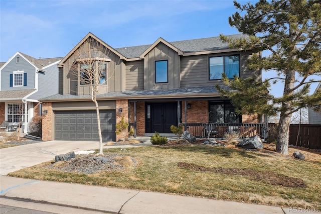 view of front of house with concrete driveway, an attached garage, fence, board and batten siding, and brick siding