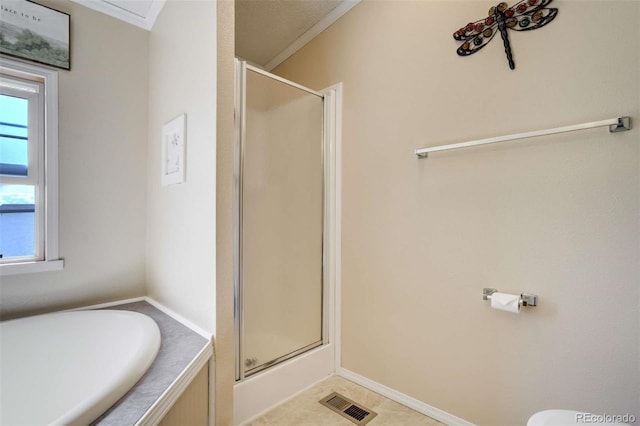 15650 W Valdez Cir, Peyton, CO 80831 - bathroom with a shower stall, crown molding, and a garden tub