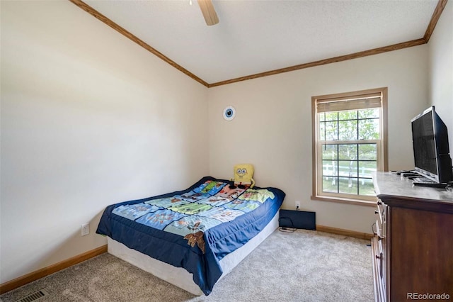 15650 W Valdez Cir, Peyton, CO 80831 - bedroom with crown molding, carpet, baseboards, ceiling fan, and lofted ceiling