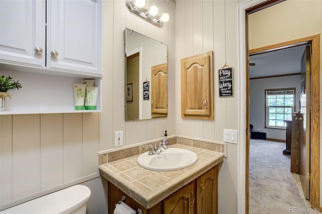 15650 W Valdez Cir, Peyton, CO 80831 - half bath featuring vanity and toilet