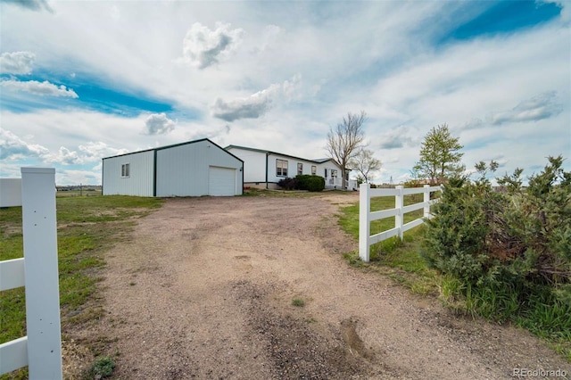 15650 W Valdez Cir, Peyton, CO 80831 - view of outdoor structure with fence and dirt driveway