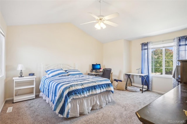 bedroom featuring vaulted ceiling, carpet, and ceiling fan