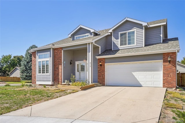 view of front of property with a garage