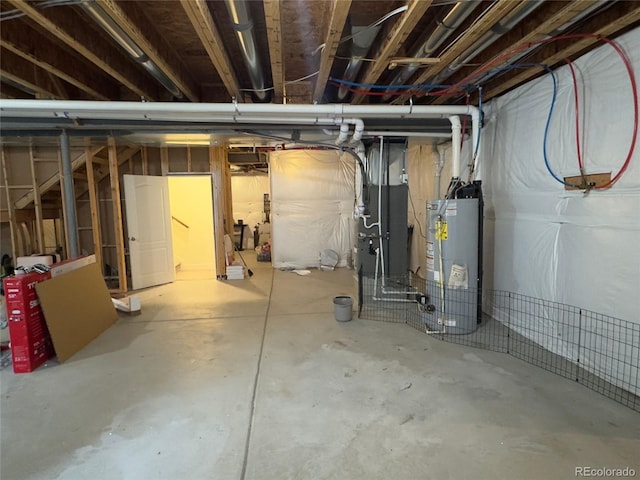 basement featuring heating unit and water heater