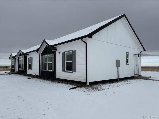 view of snow covered property