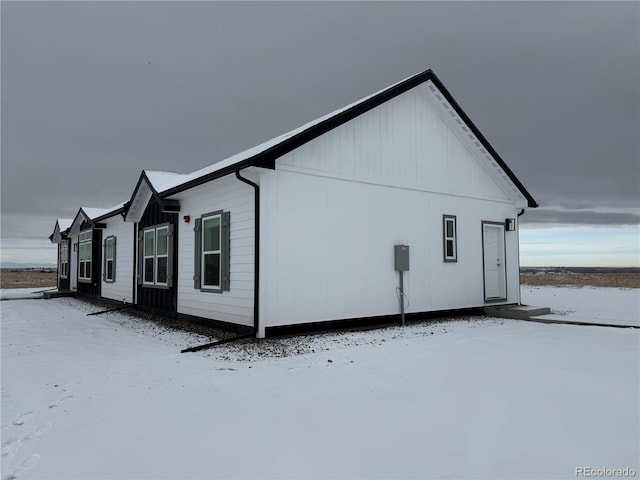 view of snow covered property