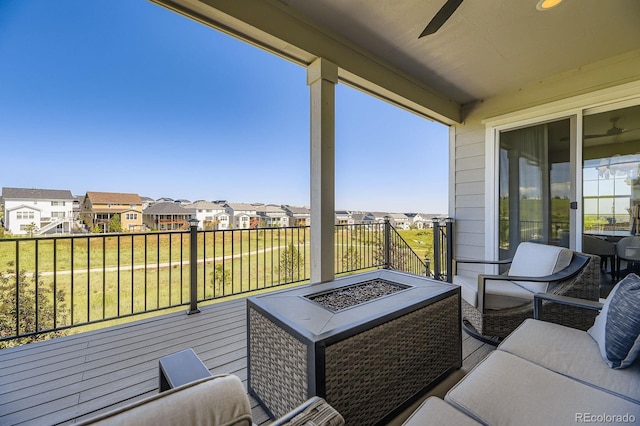 7253 S Valleyhead Ct, Aurora, CO 80016 - balcony with a residential view, an outdoor fire pit, and ceiling fan