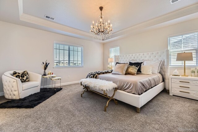 7253 S Valleyhead Ct, Aurora, CO 80016 - carpeted bedroom featuring a raised ceiling, a chandelier, and crown molding