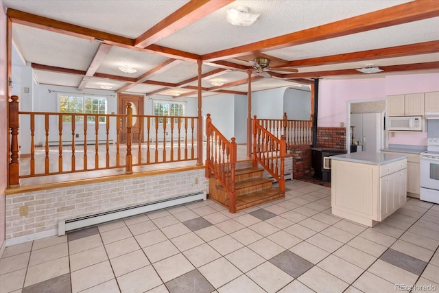 7032 County Road 156c, Salida, CO 81201 - kitchen with a ceiling fan, white appliances, beam ceiling, a baseboard radiator, and baseboard heating