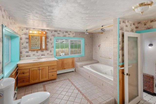 7032 County Road 156c, Salida, CO 81201 - full bath with a garden tub, tile patterned floors, baseboard heating, and toilet