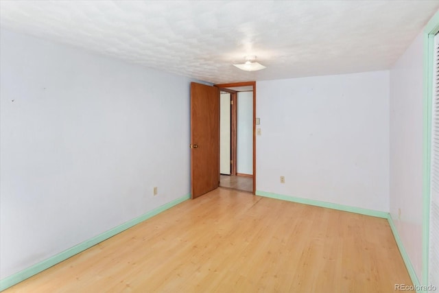 empty room featuring light wood-type flooring