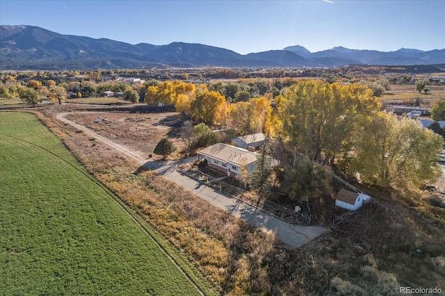 aerial view featuring a mountain view and a rural view