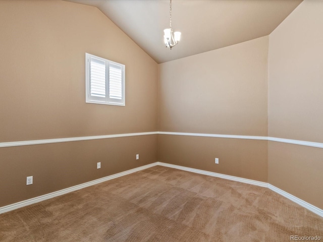 11962 W Long Cir Unit 203, Littleton, CO 80127 - carpeted spare room with vaulted ceiling and a chandelier