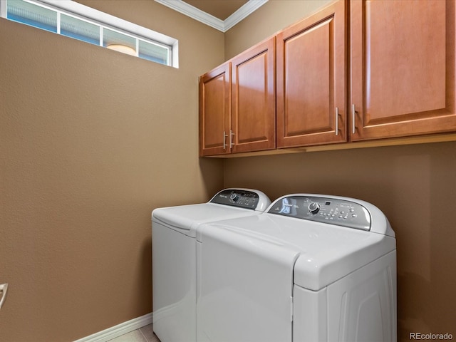 11962 W Long Cir Unit 203, Littleton, CO 80127 - laundry area with washing machine and dryer, ornamental molding, and cabinet space