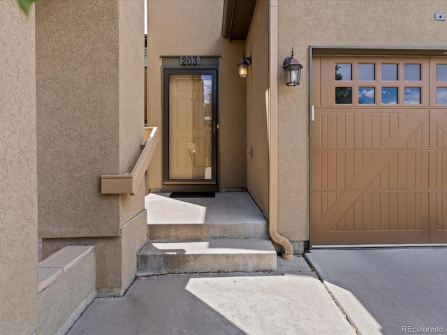 11962 W Long Cir Unit 203, Littleton, CO 80127 - property entrance featuring stucco siding