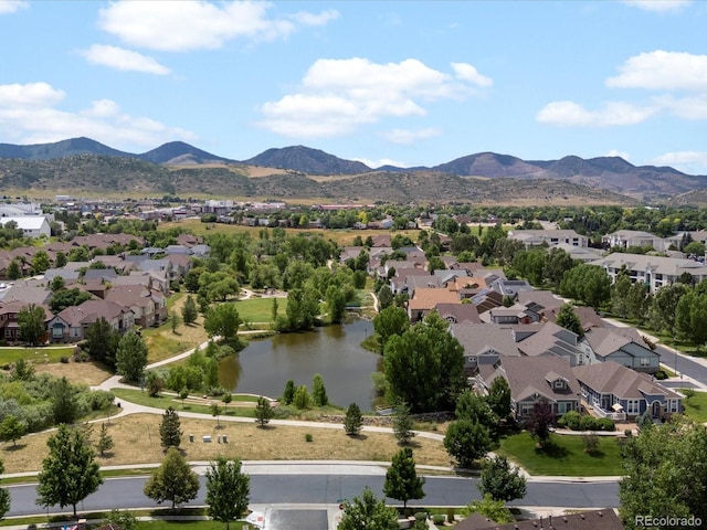 11962 W Long Cir Unit 203, Littleton, CO 80127 - aerial perspective of suburban area with a water and mountain view