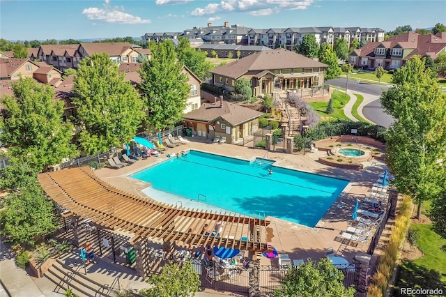 11962 W Long Cir Unit 203, Littleton, CO 80127 - community pool with a residential view, a hot tub, stairway, and a patio
