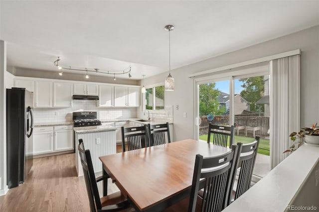 6307 Monterey Pl, Highlands Ranch, CO 80130 - dining space featuring light wood finished floors