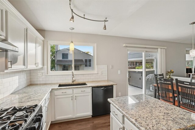 6307 Monterey Pl, Highlands Ranch, CO 80130 - kitchen featuring black appliances, a sink, decorative backsplash, and white cabinetry