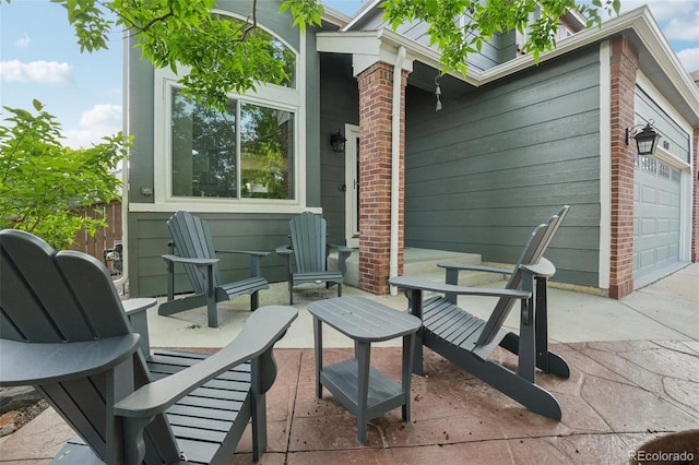 6307 Monterey Pl, Highlands Ranch, CO 80130 - view of patio / terrace featuring concrete driveway and an attached garage