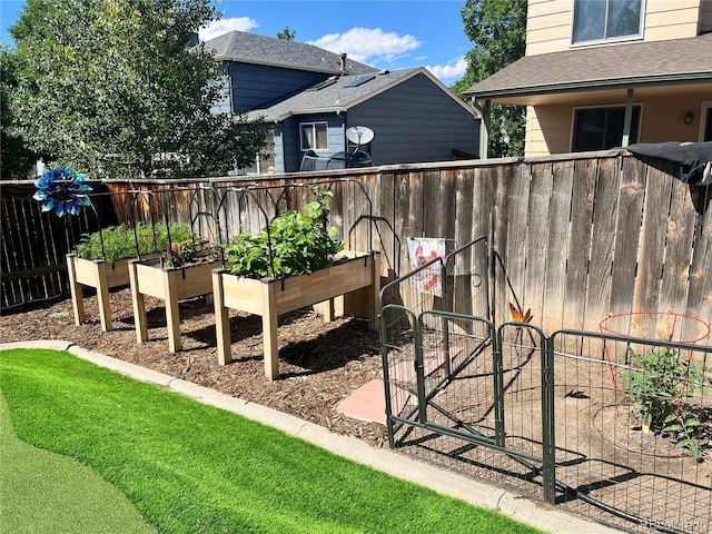 6307 Monterey Pl, Highlands Ranch, CO 80130 - view of yard with a vegetable garden