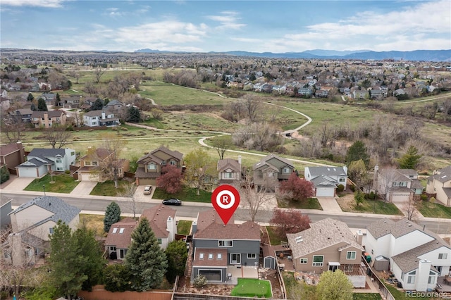6307 Monterey Pl, Highlands Ranch, CO 80130 - aerial perspective of suburban area featuring a mountain backdrop
