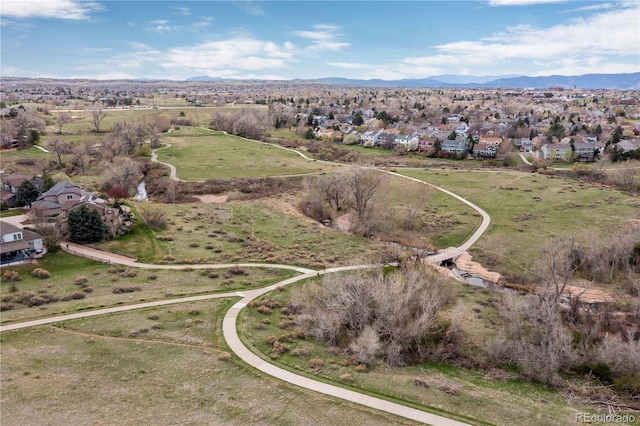 6307 Monterey Pl, Highlands Ranch, CO 80130 - aerial view of property and surrounding area with nearby suburban area and a mountain backdrop