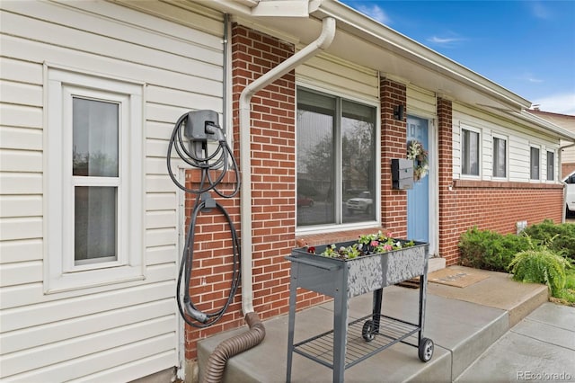 view of home's exterior with brick siding