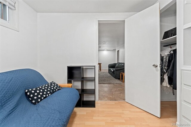 bedroom with wood finished floors