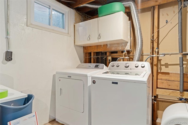 washroom with washing machine and dryer