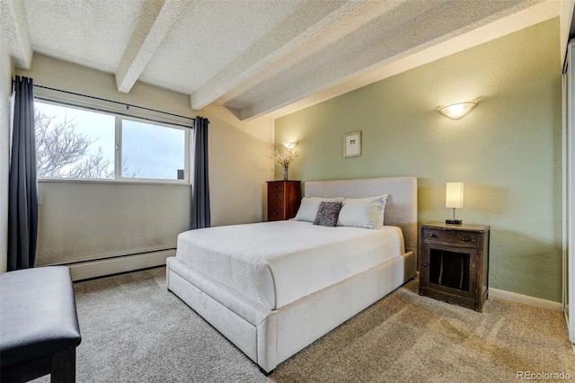 carpeted bedroom with baseboards, a textured ceiling, beamed ceiling, and baseboard heating