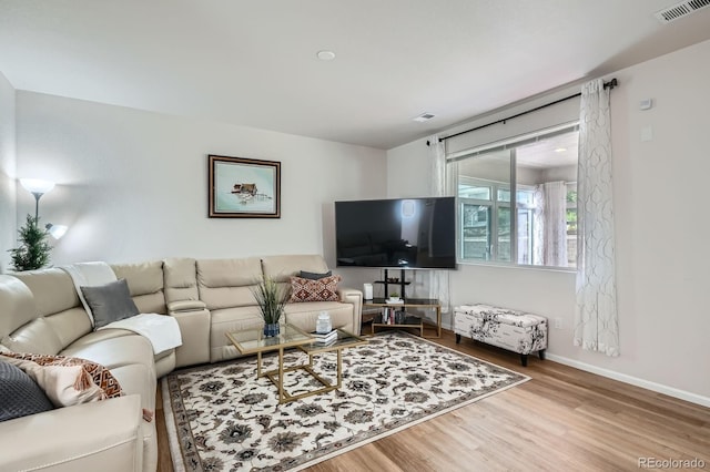 21837 E Stanford Cir, Aurora, CO 80015 - living area with wood finished floors and baseboards