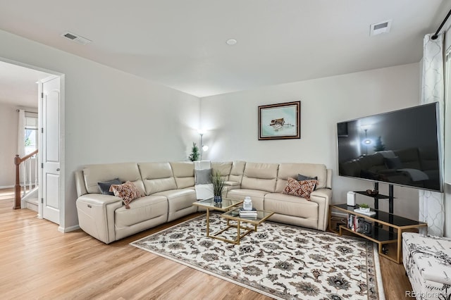 21837 E Stanford Cir, Aurora, CO 80015 - living area featuring light wood-style floors and baseboards