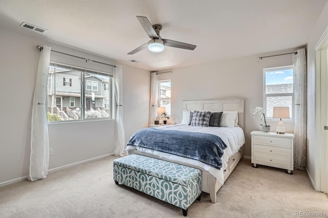 21837 E Stanford Cir, Aurora, CO 80015 - bedroom featuring light carpet and ceiling fan