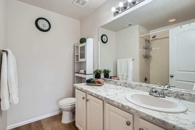 21837 E Stanford Cir, Aurora, CO 80015 - full bath with wood finished floors, a shower, and vanity