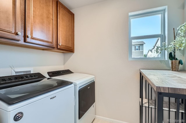 21837 E Stanford Cir, Aurora, CO 80015 - laundry room featuring washing machine and clothes dryer and cabinet space