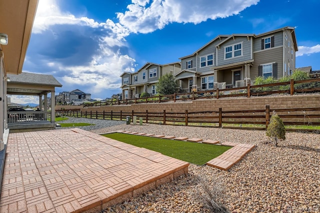 21837 E Stanford Cir, Aurora, CO 80015 - view of yard with a residential view and a patio