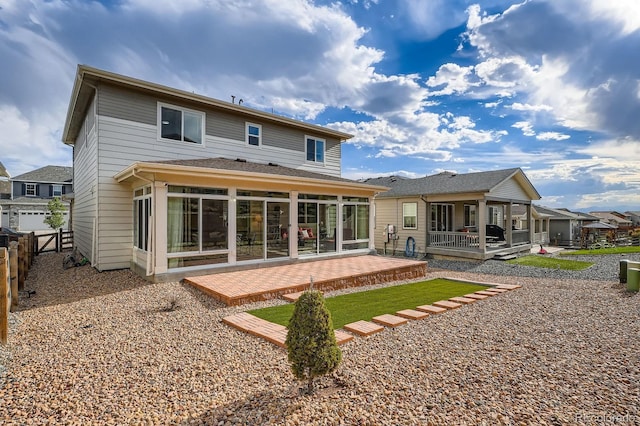 21837 E Stanford Cir, Aurora, CO 80015 - back of house featuring a sunroom and a patio
