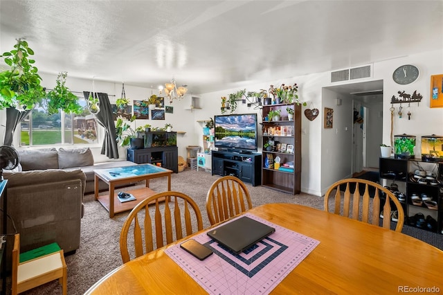 3613 S Sheridan Blvd Unit 10, Denver, CO 80235 - dining room with a chandelier and carpet