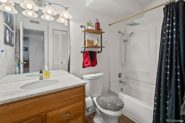 3613 S Sheridan Blvd Unit 10, Denver, CO 80235 - bathroom featuring vanity, shower / bath combination with curtain, and wood finished floors