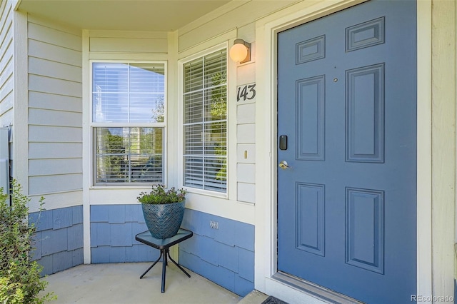 9653 Deerhorn Ct Unit 143, Parker, CO 80134 - doorway to property featuring covered porch