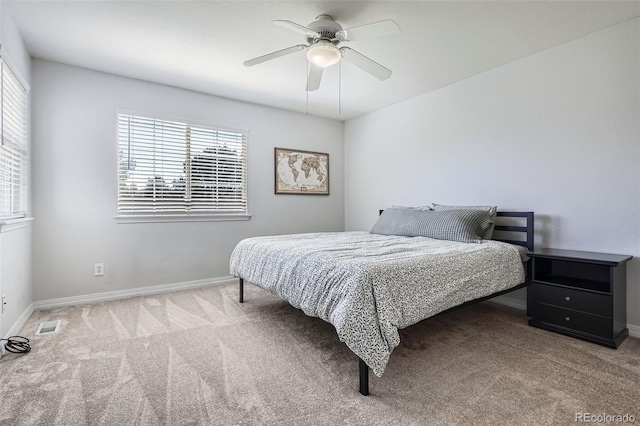 9653 Deerhorn Ct Unit 143, Parker, CO 80134 - carpeted bedroom with baseboards and a ceiling fan