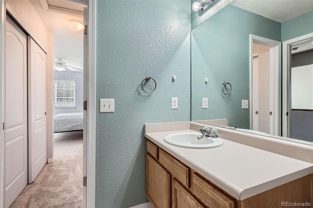 9653 Deerhorn Ct Unit 143, Parker, CO 80134 - ensuite bathroom with a textured wall and vanity