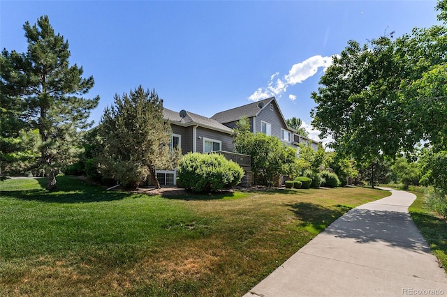 view of home's exterior featuring a lawn